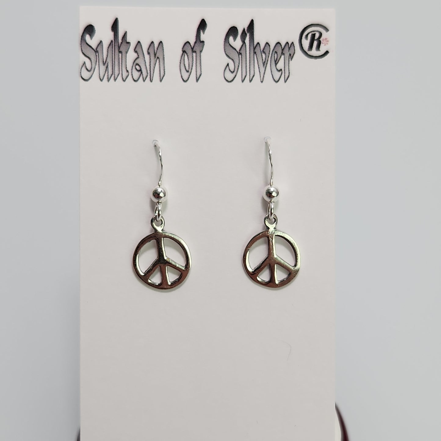 Peace symbol earrings
