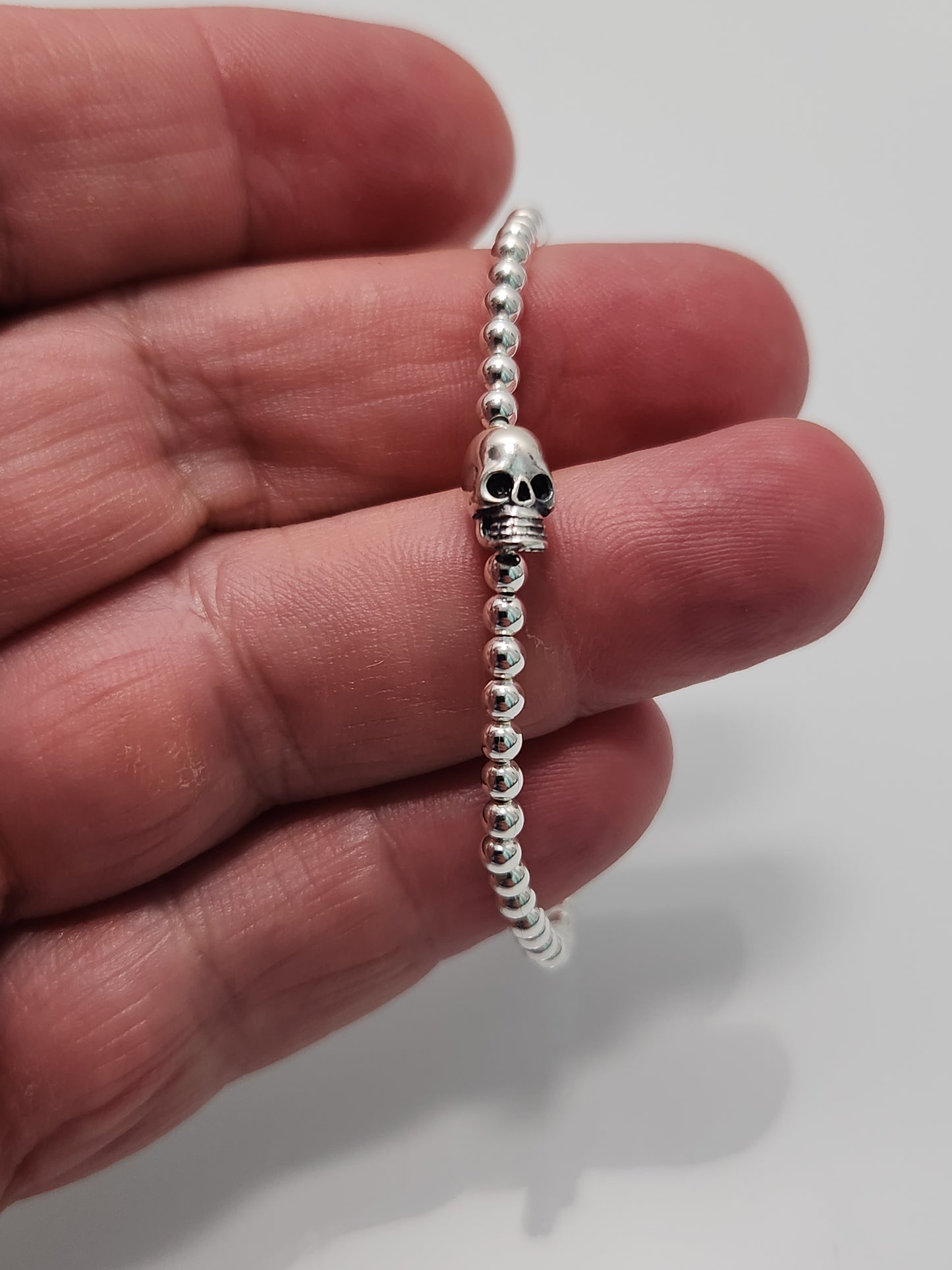 Silver Skull Bead Stretch Bracelet