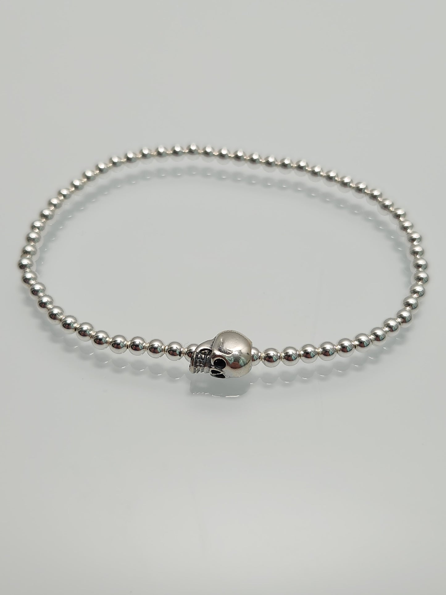 Silver Skull Bead Stretch Bracelet